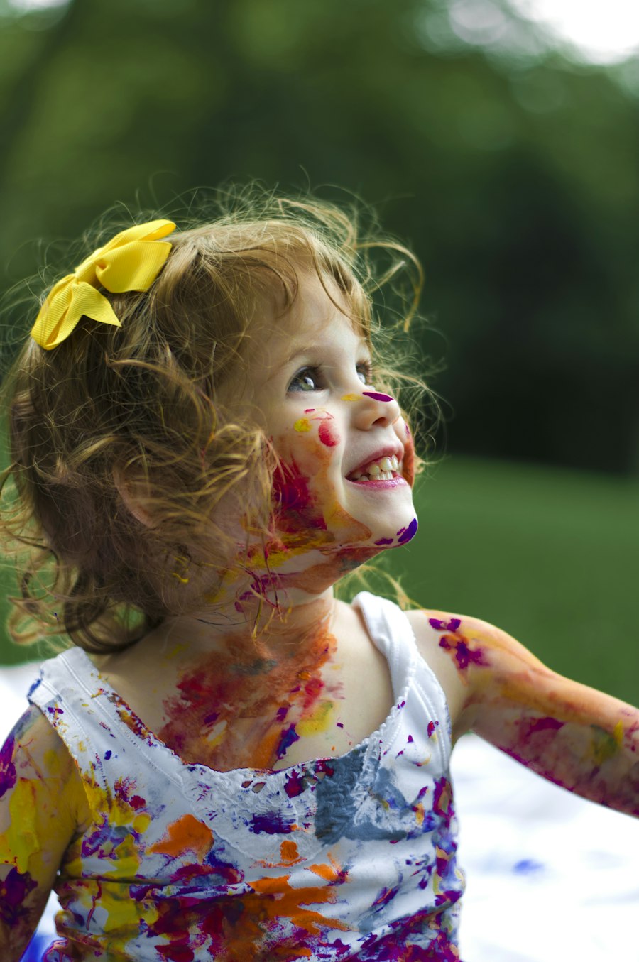 Elif smiling outdoors